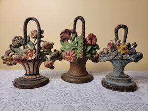lot 309 image: Antique Cast Iron Flower Basket Doorstops, A