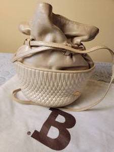 lot 118 image: Bally Quilted Champagne Leather Pouch Handbag Purse
