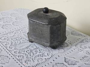 lot 87 image: Antique Lead Monkey Press Tea Caddy