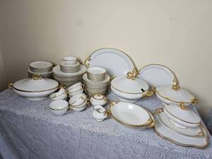 lot 683 image: William Guerin & Co French Limoge China Service with Gold Brimmed Design