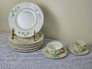 lot 281 image: Irish Belleek Shamrock Bread Plates & Two Cups & Saucers