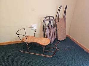 lot 702 image: Antique Childrens Steel Runner Sleds