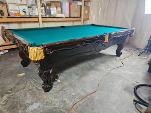 Brunswick Orleans 9-Foot Pool Table: Dark Oak Finish, Rams Head Legs, Gold Fringe Pockets