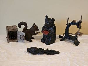lot 718 image: Cast Iron Miniatures (Banks, Nutcracker & Sewing Machine