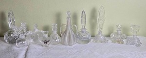 lot 660 image: Glistening Colorless Crystal Perfume Bottle Collection - (10)
