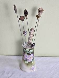 lot 657 image: Weiman Antique German Porcelain Hat Pin Holder with Antique Hat Pins