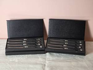lot 645 image: Laguiole Stainless Steel Steak Knife Set - (16)