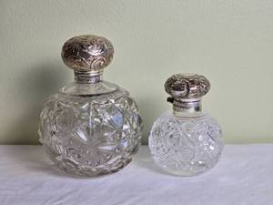 lot 663 image: Brilliant Vintage Crystal Perfume Bottle Pair with Sterling Silver Stopper