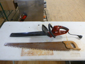 lot 73 image: Hedge Trimmer and Hand Saw