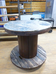 lot 43 image: Wooden Spool Table on Swivel Casters