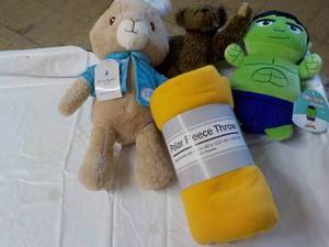 lot 90 image: Polar Fleece Throw and Stuffed Toys...
