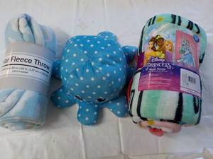 lot 95 image: Throws and Octopus...