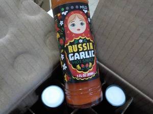 lot 191 image: 36 ct Russia Garlic Hot Sauce...