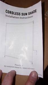 lot 22 image: cordless sun shade...