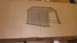 lot 75 image: portabke storage shed...