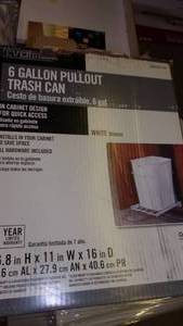lot 87 image: 6 gallon pull out trash can...