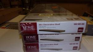 lot 88 image: 3- 36 inch decortaive shelfs...