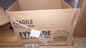 lot 108 image: fire side gas log set...