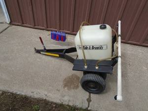 Ride & Beautify self pumping lawn sprayer. Good condition. As shown.
