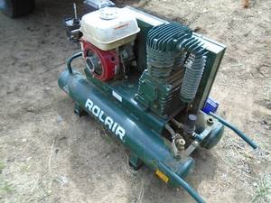 Rollair twin tank air compressor for parts & repair. As shown.