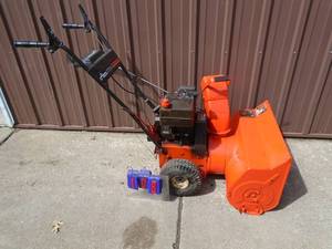 lot 108 image: Ariens ST504 snow blower. Tested & works. As shown.