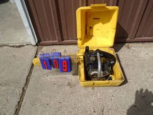 lot 109 image: McCullough 2014v silver eagle chainsaw. Untested. With case. As shown.
