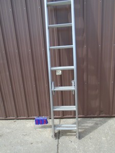 lot 112 image: Werner 12 - 14 extended ladder. Slight on one side. As shown.