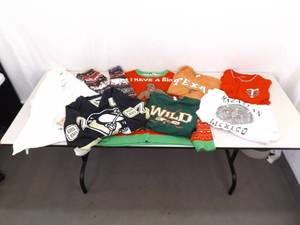 lot 19 image: Lot of Novelty Clothes, Jerseys, Gag Sweaters, etc.