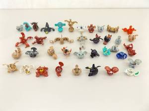 lot 50 image: Lot of 38 Vintage Bakugan Toys