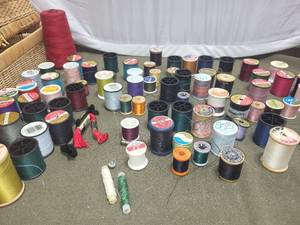lot 105 image: Collection of Sewing Thread Spools with Wicker Storage Basket and Sewing Stool