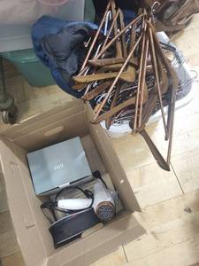 lot 105P image: Assorted Household Items including Wooden Hangers, Hair Dryer, Blanket, and Humidifier