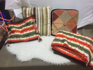 lot 114 image: Set of 2 Handwoven Throws, 2 Decorative Cushions, and Faux Fur Rug