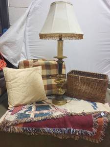 lot 116 image: Home Decor Set with Vintage Table Lamp, Wicker Basket, Cushions, and Santa Throw Blanket