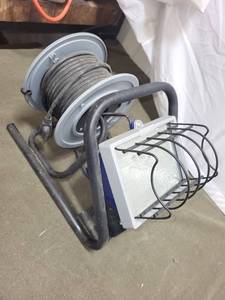 lot 143 image: Portable Work Light with Long Power Cord Reel