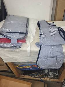 lot 327 image: Set of Unopened Blue Pinstripe Aprons and Bibs