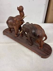 lot 93 image: Hand-Carved Wooden Elephant Figurine Set on Stand