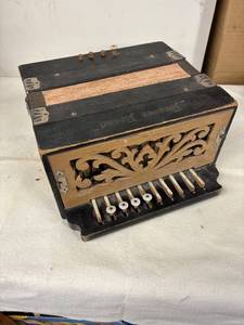 lot 99 image: Beaver Brand Vintage Accordion with Ornate Wooden Grill