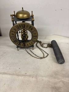 lot 209 image: Antique Brass and Iron Wall Clock Movement with Chain and Weight