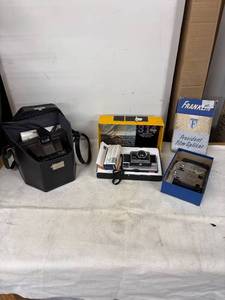 lot 215 image: Vintage Polaroid Camera, Kodak Instamatic 314, and Franklin Film Splicer Set