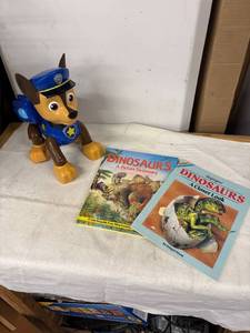 lot 218 image: Paw Patrol Chase Vehicle Toy and Set of 2 Dinosaur Books by Dougal Dixon