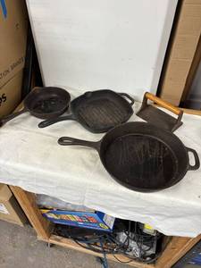 lot 219 image: Collection of Vintage Cast Iron Cooking Skillets and Bacon Press