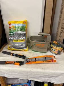 lot 222 image: Lawn and Garden Care Bundle - Scotts Turf Builder, Fiskars Shears, Pocket Hose, and Scotts Wizz Spreader