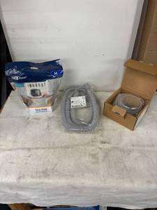 lot 319 image: Fisher & Paykel CPAP Supplies Nasal Mask, Heated Breathing Tube, and Water Chamber