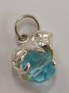 lot 34J image: Sterling Silver Cat Charm with Faceted Blue Glass Bead