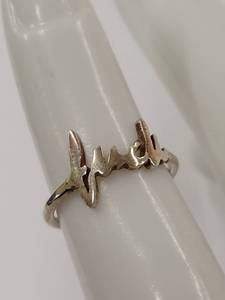 lot 78J image: Sterling Silver Luck Script Design Ring