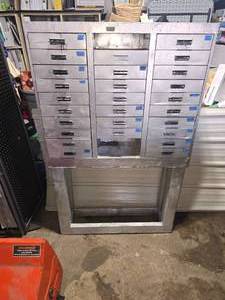 lot 1 image: metal drawer with 2x4 base