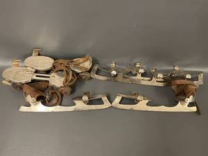 lot 8T image: Vintage Saranac Winchester Ice and Roller Skates Sets