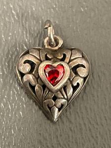 lot 139Q image: Sterling Silver Heart Pendant with Red Gemstone