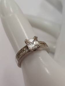 lot 191Q image: Elegant Sterling Silver Ring with Square Solitaire Stone