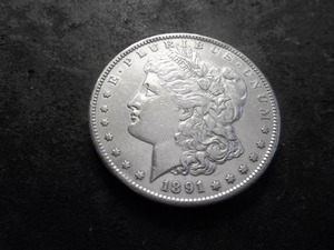 lot 16 image: 1891 S Morgan Silver Dollar